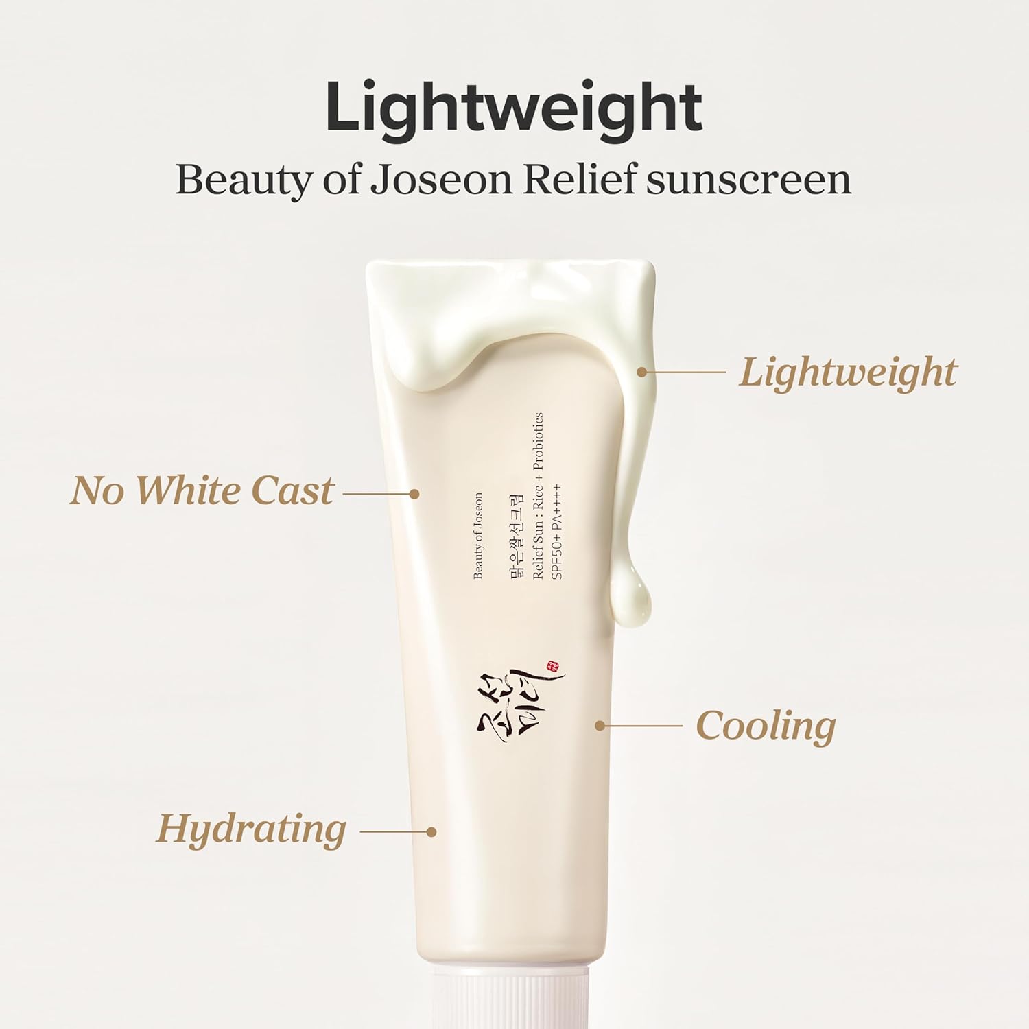 Sunscreen cream tube with text highlighting its features on a light gray background