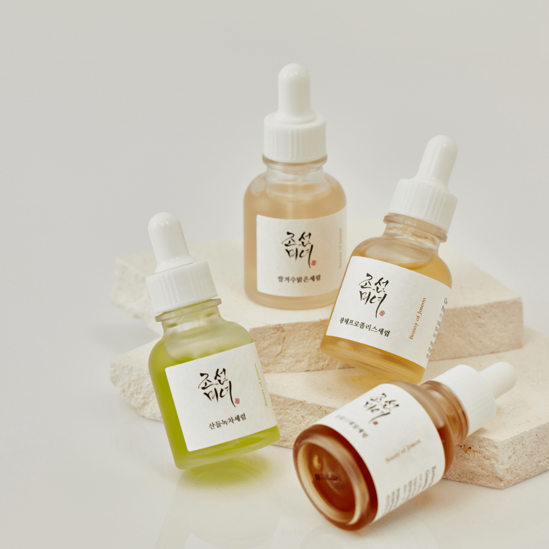 Four dropper bottles with labels on a light backgroundshop_this_look_amDhCa